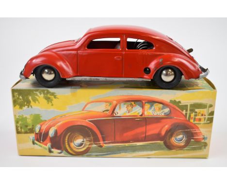 Distler clockwork pressed tin Split Window VW Beetle with red body, silver hubs and D-3070 registration plates, stamped Made 