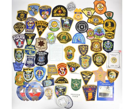 Large collection of approximately 300 American Police cloth badges including Parkland Police, County of Nassau NY, Worcester 
