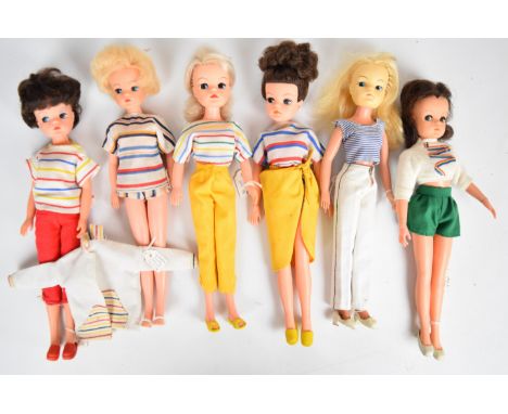 Six vintage Sindy dolls by Pedigree dressed in 1960's &amp; 70's casual or sports clothing.