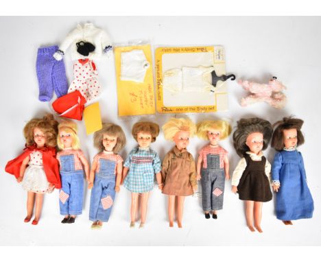 Eight vintage Sindy Patch dolls by Pedigree dressed in original 1960's outfits, together with a small collection of additiona