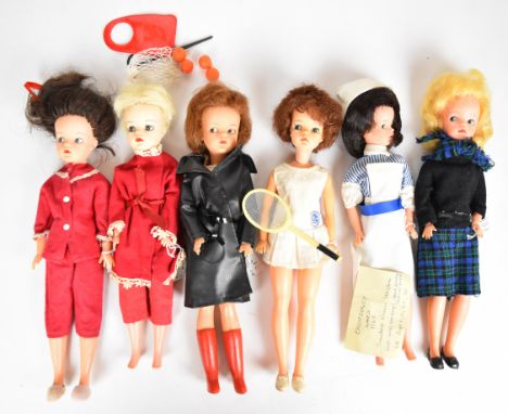 Six vintage Sindy dolls by Pedigree in original outfits to include Frosty Nights, Centre Court, Nurse and Lunch Date.