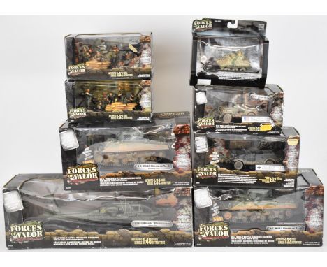 Eight Unimax Forces of Valour 1:72 and 1:32 scale diecast model tanks and similar military vehicles to include U.K. M3 Grant,