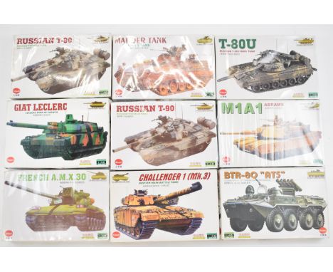 Nine Kitech World Famous Tank Series 1:48 scale motor driven plastic model kits to include Russian T-90, German Marder, Chall