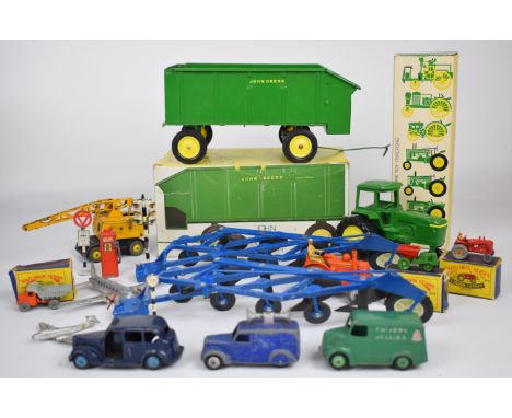 A small collection of&nbsp; Dinky, Matchbox and Ertl cars, planes and farm vehicles to include vintage examples, Austin Taxi 