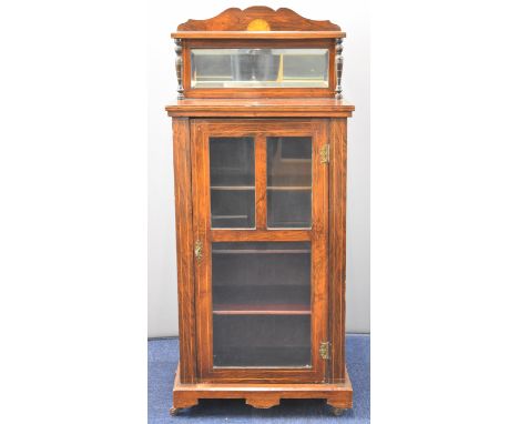 19thC rosewood music cabinet with shelf above a bevelled mirror, having glazed main door opening to reveal fitted shelves, al