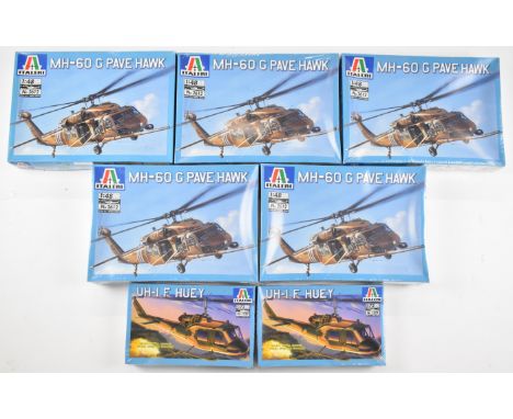 Seven Italeri 1:72 and 1:48 scale plastic model helicopter kits comprising two UH-I F Huey 1229 and five MH-60 G Pave Hawk 26