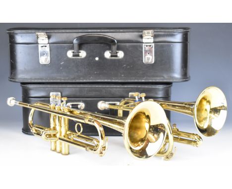 Two Boosey and Hawkes brass musical instruments comprising B&amp;H 400 Bb trumpet serial no. 093523 and a York International 