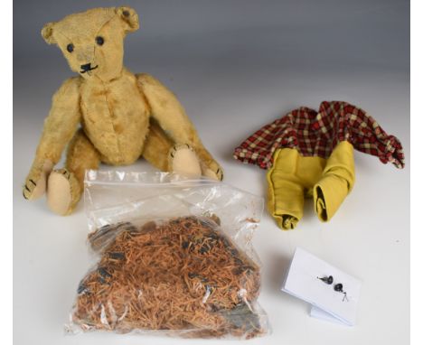 Early 20th century Steiff Teddy bear with stuffed body, jointed limbs, blonde mohair, black eyes and button in ear, together 