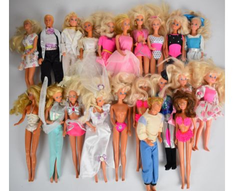 Twenty Mattel Barbie dolls dressed in a range of evening, sports and casual clothing.