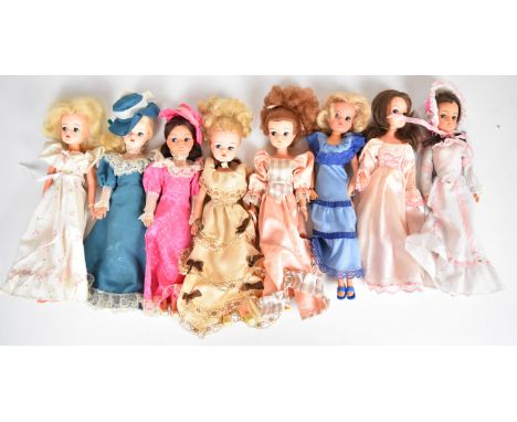 Eight vintage Sindy dolls by Pedigree dressed in Southern Belle and similar clothing.