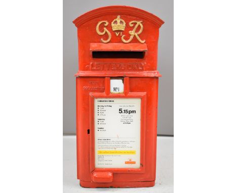 George VI cast iron lamp post mounted letter box with GR VI and crown to top and information board to front for Charles Stree