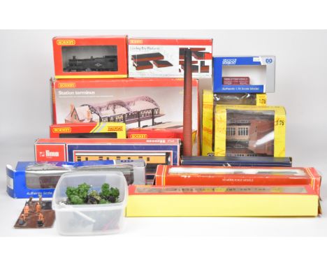 A collection of 00 gauge model railway to include Mainline and Hornby locomotives, passenger carriages, buildings and rolling