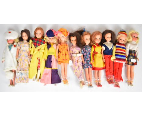 Eleven vintage Sindy dolls by Pedigree dressed in original 1970's outfits to include Sunspotter, Quick Change, Bridesmaid and