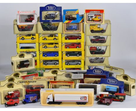 Over fifty diecast model cars to include Maisto, Models of Yesteryear and Days Gone, all in original boxes.