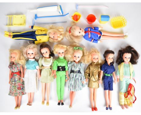 Ten vintage Sindy dolls by Pedigree dressed in 1980's outfits to include Jogger, High Energy, Sunshine Sindy, Bomber Jacket a