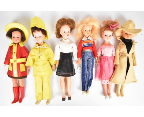 Six vintage Pedigree Sindy Dolls dressed in 1960's / 70's outfits.