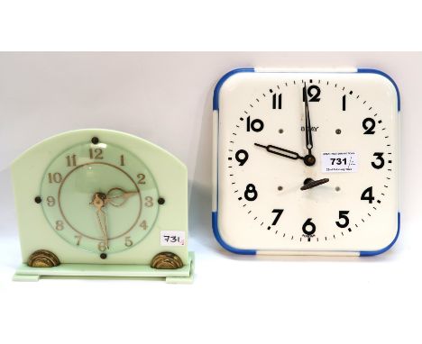 A glazed ceramic square wall clock and a green plastic example Condition Report: Available upon request