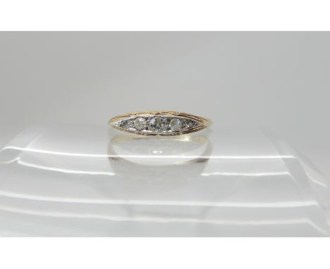 An 18ct gold five stone diamond ring of estimated approx 0.14cts, size N1/2 weight 2.1gms Condition Report: Available upon re