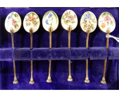 A cased set of six silver, gilt and floral enamel coffee spoons, Birmingham 1984 Condition Report: Available upon request