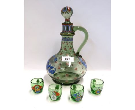 A continental green glass ewer with four small handled glasses, each painted in enamels of arms and a knights helmet (5) Cond