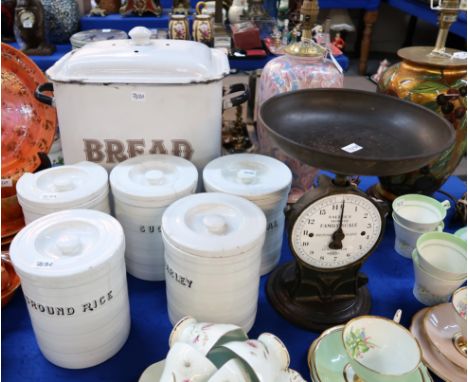 An enamel bread bin, a pair of Sater's family scales and five Cetem ware white glazed storage jars Condition Report: Availabl