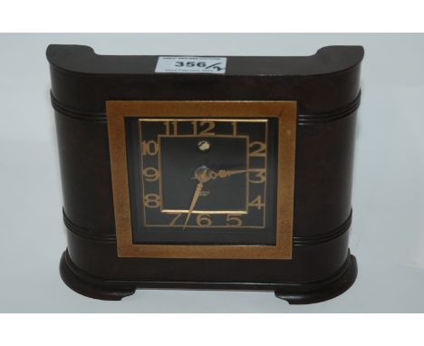 A Smiths Bakelite mantle clock and an AA car mascot (2) Condition Report: Available upon request