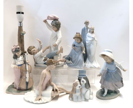 Six Nao figures including a bride and groom and a lamp base Condition Report: Ballerina has broken legs and dog has flowers m