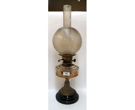 A brass oil lamp Condition Report: Available upon request