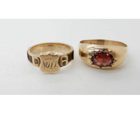 A 9ct gold garnet set gents ring size W1/2 and a yellow metal hair panel 'regard' mourning ring size P, combined weight 8.4gm