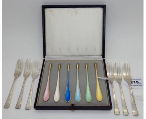 A lot comprising a cased set of six Norwegian sterling silver and enamel salt spoons and six silver cake forks, Birmingham 19