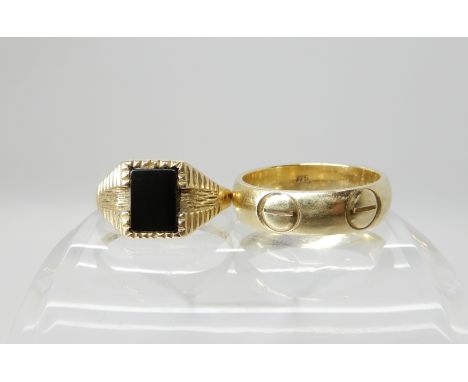 A 9ct gold wedding ring size O1/2, and a 9ct gold onyx signet ring size P, weight combined 7gms Condition Report: Available u
