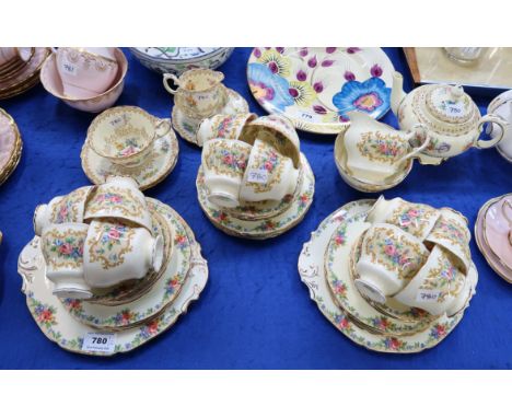 A Paragon Minuet tea set comprising twelve cups, saucers, plates, two cake plates, milk jug and sugar bowl, together with a C