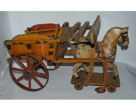 A vintage horse and cart, 60cm long and another vintage cart (2) Condition Report: Available upon request