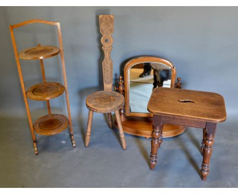 An Edwardian Mahogany Three Tier Folding Cake Stand, together with a swing frame toilet mirror, a rectangular stool and a mil