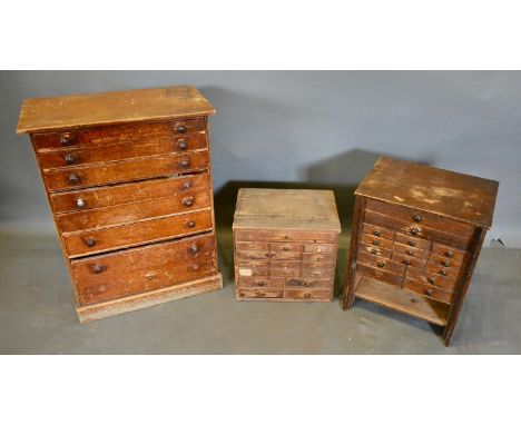 Three Collectors Chests containing a large collection of watchmakers parts, accessories and tools 