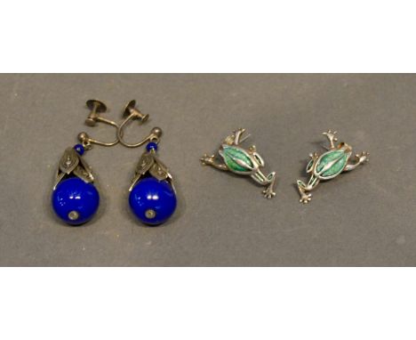 A Pair of Silver and Blue Stone Set Drop Earrings, together with a pair of silver and enamel drop earrings in the form of fro