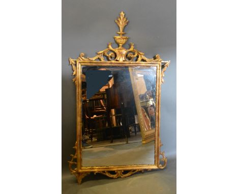 A 19th centry Gilt Framed Wall Mirror, with pierced carved cresting 123cm high by 74cm wide 