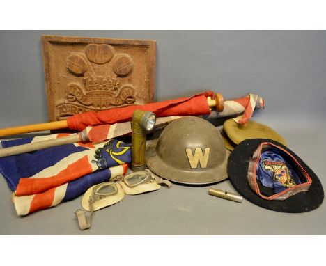 A Second World War Warden's Helmet, together with other related items to include three British flags, a pair of flying goggle