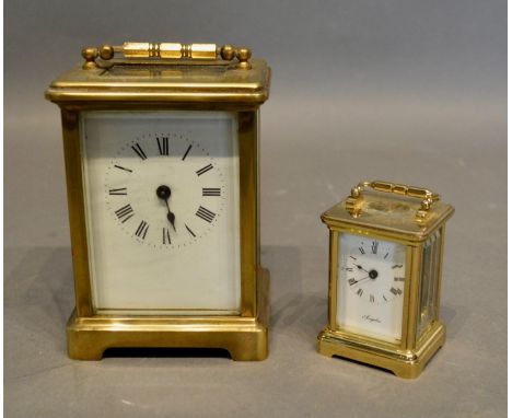 A French Brass Cased Carriage Clock with lever escapement, together with a miniature brass carriage clock 