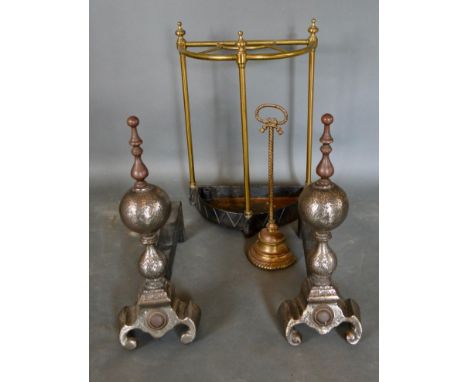 A Pair of Heavy Andirons of bulbous form, together with a brass stick stand and a brass door stop 