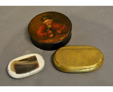 A 19th Century Lacquered Snuff Box, hand painted with the image of a man counting money, together with a similar 19th century