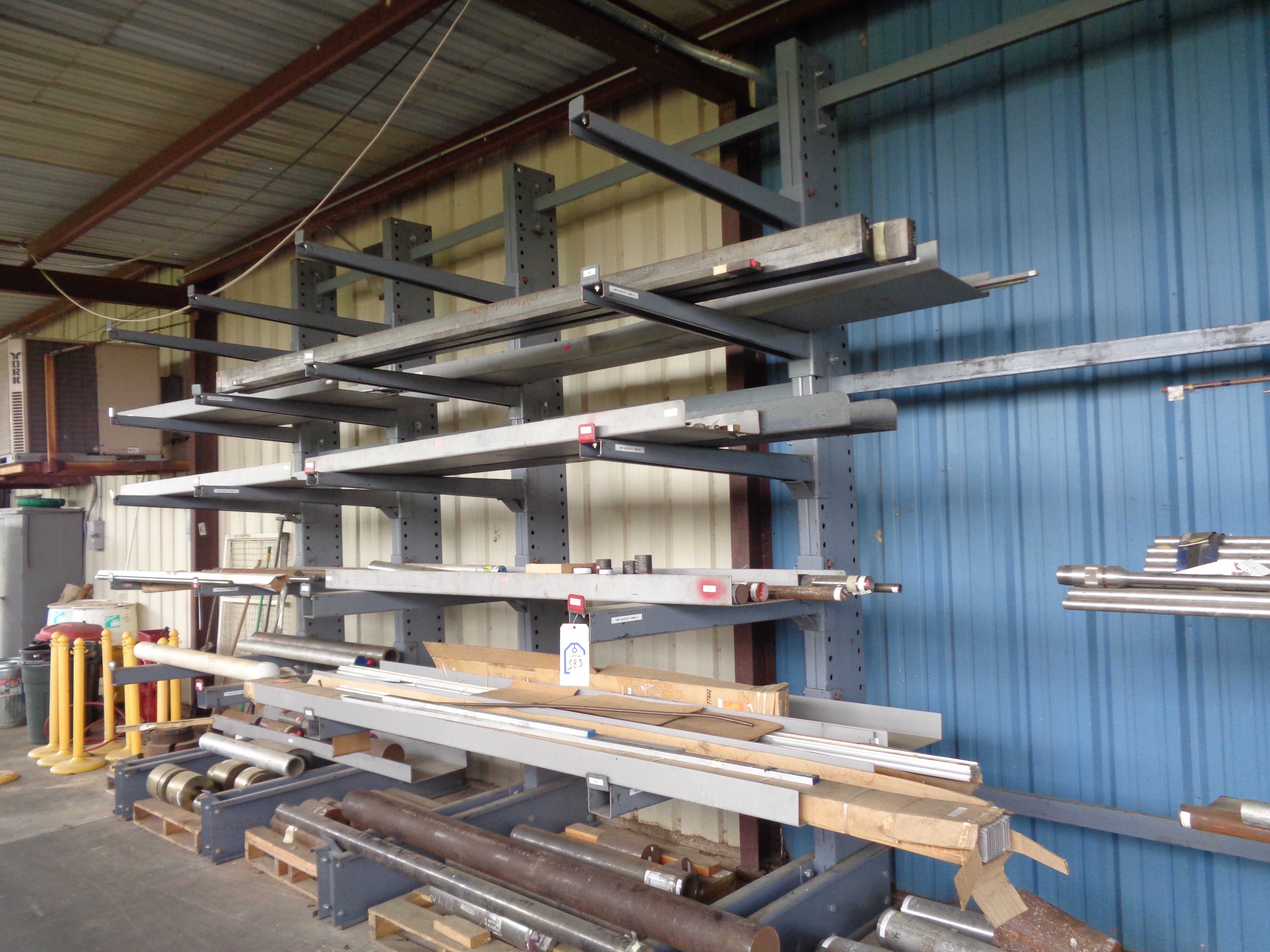 30' of Cantilever Style Steel Stock Shelving, Qty (18) 2500 capacity arms, Qty (12) 4000 ca