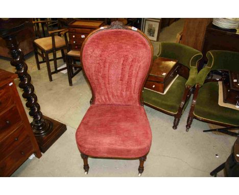 19th century Walnut Framed and Red Upholstered Balloon Back Nursing Chair raised on Turned Front Legs and terminating in Cera