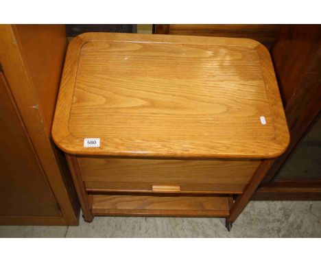 Mid 20th century Pale Oak ' Jonell ' Sewing Cabinet / Work Box with Hinged Lift Lid over Single Drawer and Shelf, raised on C