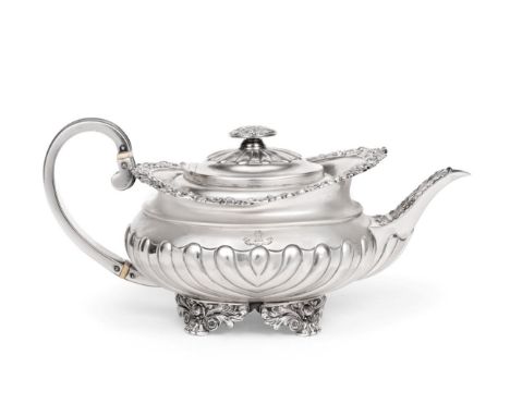 A George IV Silver Teapot, Michael Starkey, London 1821, of circular part fluted form, with elaborate foliate, scroll and she