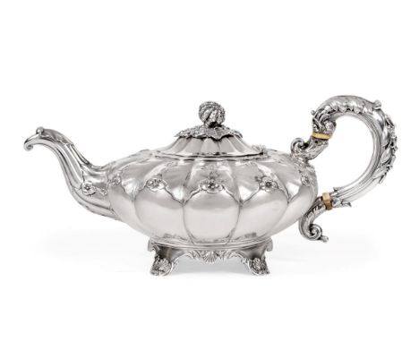 A William IV Silver Teapot, Charles Fox, London 1830, squat circular melon fluted form with foliate embellishments, the hinge