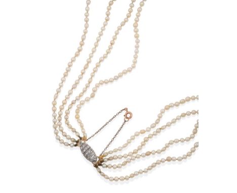 A Four Row Pearl Necklace, the off-round 101:105:114:120 pearls strung to a lozenge shaped clasp set with rose cut diamonds, 