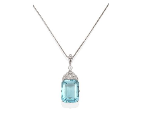 An Aquamarine and Diamond Pendant on Chain, the emerald-cut aquamarine in a claw setting, surmounted by a diamond set pierced