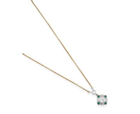 A Diamond and Emerald Pendant Necklace, the drop comprised of a round brilliant cut diamond surmounting a cluster of a round 