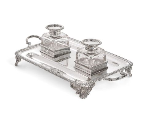 A George V Silver Inkstand, Thomas Bradbury &amp; Sons, Sheffield 1926, rounded rectangular with gadroon border, reeded folia